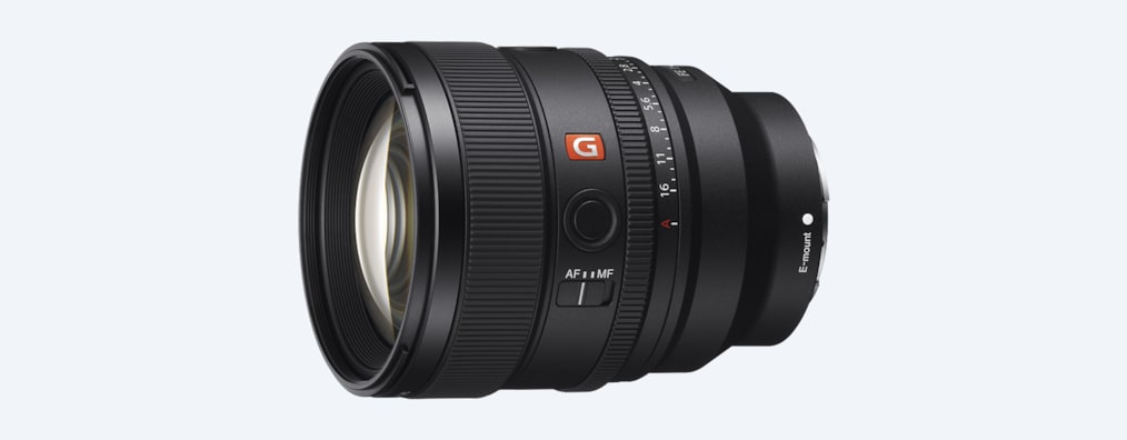 A product image showing the front left view of the lens