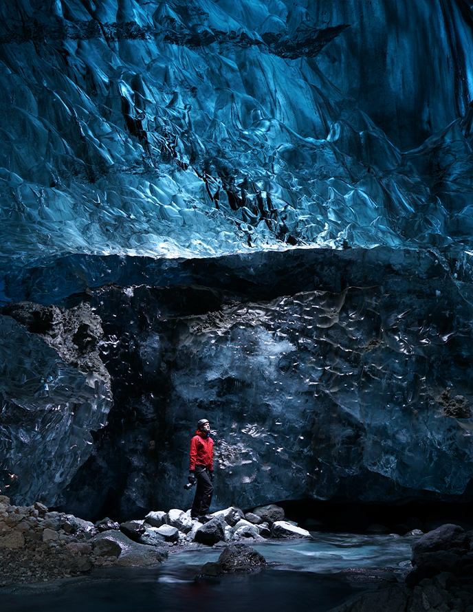 Sample image of a man climbing in an ice cave.